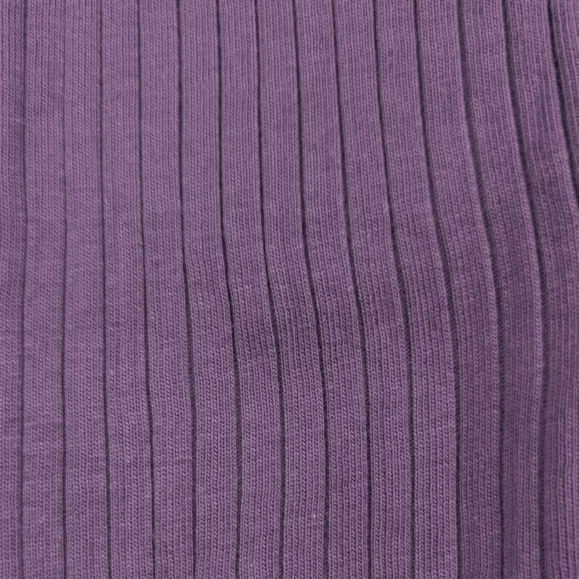 Close-up of purple ribbed fabric organic cotton