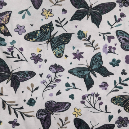 Pattern of butterflies and flowers on a white background