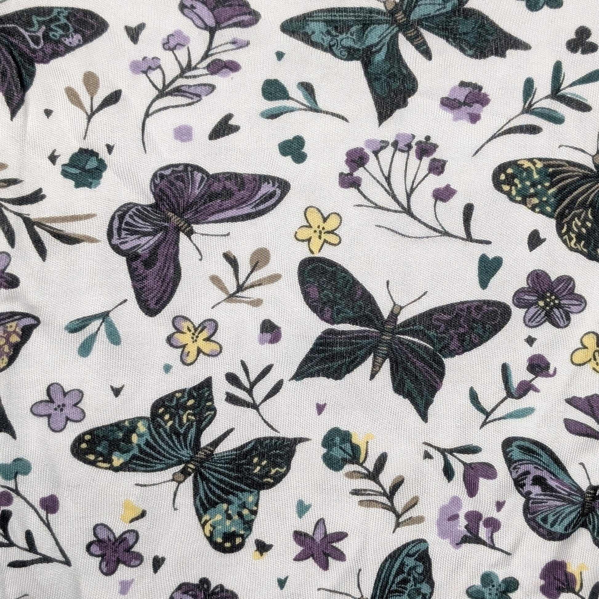 Baby onesie with butterfly and floral pattern on a white background