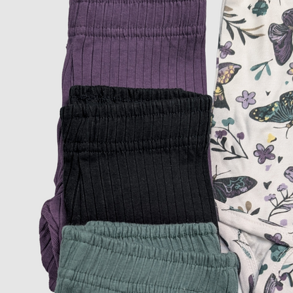 Set of folded pants in various colors organic cotton